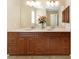 Charming bathroom featuring double sinks, granite counters, and modern fixtures at 3753 Aba Ln, North Port, FL 34287