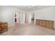Spacious bedroom with neutral carpet and a large dresser at 3753 Aba Ln, North Port, FL 34287