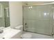 Clean bathroom with a shower-tub combination and a modern vanity at 409 Ricold Ter, Port Charlotte, FL 33954