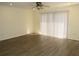 Bright living room with hardwood floors, neutral walls, and recessed lighting at 409 Ricold Ter, Port Charlotte, FL 33954