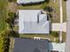 Aerial view of the home's roof and surrounding landscaping at 478 Winwood Ct, Port Charlotte, FL 33954