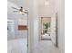 Bright foyer featuring tiled floors and views of the front porch and living areas at 478 Winwood Ct, Port Charlotte, FL 33954