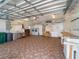 Spacious garage with laundry and tile flooring at 478 Winwood Ct, Port Charlotte, FL 33954
