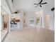 Bright and airy living area with seamless flow to kitchen and dining areas at 478 Winwood Ct, Port Charlotte, FL 33954