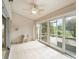 Bright sun room with tile flooring and sliding glass doors at 478 Winwood Ct, Port Charlotte, FL 33954