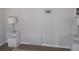 Bright bedroom with a small storage access point at 5421 Holiday Park Blvd, North Port, FL 34287