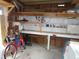 Garage with workbench and bicycle at 5421 Holiday Park Blvd, North Port, FL 34287