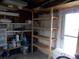 Garage shelving provides ample storage space for organizing household items at 5421 Holiday Park Blvd, North Port, FL 34287