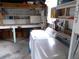Practical laundry area with washer, dryer, and ample storage at 5421 Holiday Park Blvd, North Port, FL 34287