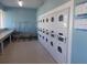 Well-maintained laundry room featuring multiple washers and dryers, providing convenience for residents at 5421 Holiday Park Blvd, North Port, FL 34287
