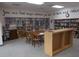 Community library offering tables, bookshelves and quiet reading spaces at 5421 Holiday Park Blvd, North Port, FL 34287
