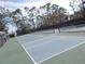 Community pickleball courts in a sunny neighborhood setting at 5421 Holiday Park Blvd, North Port, FL 34287