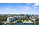 Luxury condo community offers waterfront living with private boat docks and a refreshing swimming pool at 600 Sutton Pl # 101B, Longboat Key, FL 34228