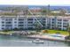 Sutton Place waterfront complex with pool and boat docks situated on the Intracoastal Waterway at 600 Sutton Pl # 101B, Longboat Key, FL 34228