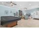 Community clubhouse room with a pool table, cozy seating, and a well-stocked library at 600 Sutton Pl # 101B, Longboat Key, FL 34228