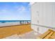 Beachside outdoor shower area, perfect for rinsing off after a day in the sun at 600 Sutton Pl # 101B, Longboat Key, FL 34228