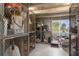 Secured storage unit with metal cage, concrete flooring and walls and access to a window at 600 Sutton Pl # 101B, Longboat Key, FL 34228