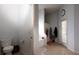 Bathroom features a toilet, bathtub, shower, and tile flooring at 7882 Dulce Ave, North Port, FL 34287