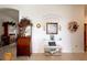 Inviting foyer area with decorative accents and a cozy bench at 7882 Dulce Ave, North Port, FL 34287