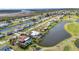 Gorgeous aerial view of waterfront homes with canals and lush landscaping at 82 Caddy Rd, Rotonda West, FL 33947