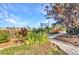 Tranquil backyard garden and lush landscaping, perfect for relaxation at 82 Caddy Rd, Rotonda West, FL 33947