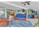 Inviting sunroom with comfortable seating and a view of the outdoors at 82 Caddy Rd, Rotonda West, FL 33947