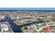 High aerial view of a waterfront neighborhood with canals and numerous homes at 955 Don Juan Ct, Punta Gorda, FL 33950