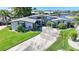 Charming home with landscaped yard and convenient driveway leading to a welcoming entrance at 955 Don Juan Ct, Punta Gorda, FL 33950