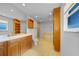 Well-lit bathroom featuring a large vanity, walk-in shower, soaking tub, and ample storage at 955 Don Juan Ct, Punta Gorda, FL 33950