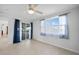 Bedroom featuring tile floors, a ceiling fan, and sliding glass doors to the exterior at 955 Don Juan Ct, Punta Gorda, FL 33950