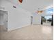 Spacious living room with high ceilings, tile floors, and neutral paint for a bright and airy feel at 955 Don Juan Ct, Punta Gorda, FL 33950