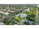Community with tennis and basketball courts surrounded by lush landscaping and mature trees at 1065 Harbour Glen Pl, Punta Gorda, FL 33983