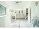 Bathroom features double sinks, glass block window, and tile flooring at 1065 Harbour Glen Pl, Punta Gorda, FL 33983