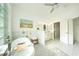 Bright bathroom with soaking tub, double sinks, and a glass block window at 1065 Harbour Glen Pl, Punta Gorda, FL 33983