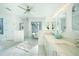 Bright, modern bathroom with soaking tub and dual vanity at 1065 Harbour Glen Pl, Punta Gorda, FL 33983