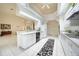 Bright, white kitchen with tile floors and modern appliances at 1065 Harbour Glen Pl, Punta Gorda, FL 33983