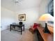 Office with neutral walls, carpet flooring, and large window for natural light at 1065 Harbour Glen Pl, Punta Gorda, FL 33983