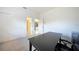 Home office with neutral walls, carpet flooring, and large desk at 1065 Harbour Glen Pl, Punta Gorda, FL 33983