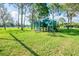 A view of the playground on a grassy lawn at 1065 Harbour Glen Pl, Punta Gorda, FL 33983