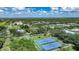 Aerial view of the tennis and basketball courts in the Harbour Oaks community at 1065 Harbour Glen Pl, Punta Gorda, FL 33983