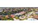 Stunning home on the water features a screened lanai with pool, dock, and gorgeous landscaping at 1311 Pine Siskin Dr, Punta Gorda, FL 33950