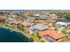 Beautiful waterfront home has a screened-in lanai with pool and private boat dock at 1311 Pine Siskin Dr, Punta Gorda, FL 33950