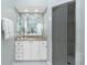 Modern bathroom with a glass-enclosed shower, granite vanity, and contemporary fixtures for a spa-like experience at 1311 Pine Siskin Dr, Punta Gorda, FL 33950