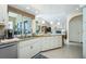 Well-equipped kitchen with a center island, ample counter space, and an open layout, ideal for cooking and entertaining at 1311 Pine Siskin Dr, Punta Gorda, FL 33950