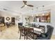 Inviting dining area open to the kitchen, featuring hardwood floors and elegant decor at 1340 Rock Dove Ct # 132, Punta Gorda, FL 33950
