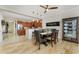 Bright dining room with modern light fixture and seating for six near the open kitchen at 1340 Rock Dove Ct # 132, Punta Gorda, FL 33950