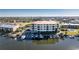 Beautiful building with private boat docks, a pool, and beautiful landscaping at 1340 Rock Dove Ct # 132, Punta Gorda, FL 33950