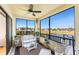 Relaxing lanai with comfortable seating and stunning water views at 1340 Rock Dove Ct # 132, Punta Gorda, FL 33950