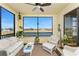 Relaxing lanai with comfortable seating and beautiful waterfront views at 1340 Rock Dove Ct # 132, Punta Gorda, FL 33950