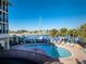 Enjoy waterfront views from the community pool near the boat docks and sunny lounging area at 1340 Rock Dove Ct # 132, Punta Gorda, FL 33950